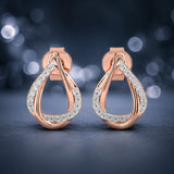 Celeste Twisted Teardrop Spark Studs