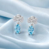 Celeste Bow Eternal Heart Drop Twirl Radiance Studs