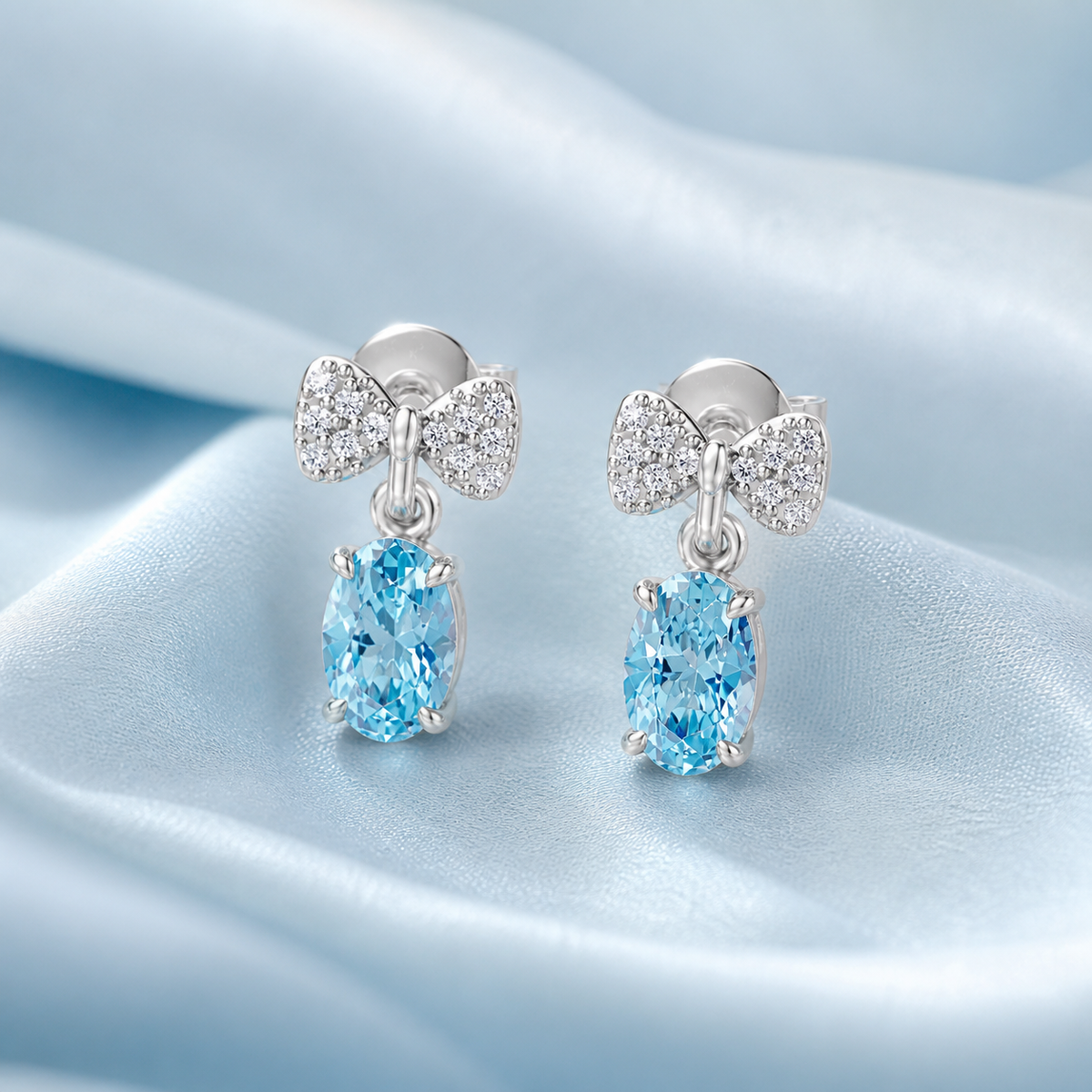 Celeste Bow Eternal Heart Drop Twirl Radiance Studs