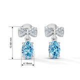 Celeste Bow Eternal Heart Drop Twirl Radiance Studs