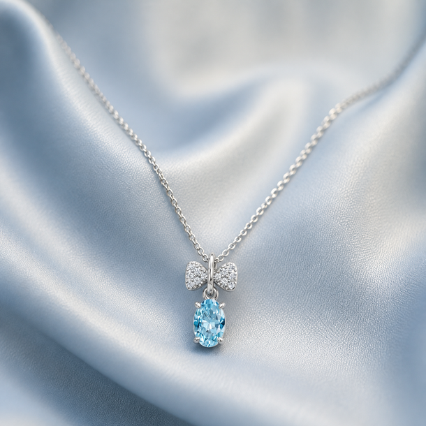 Celeste Bow Eternal Heart Drop Radiance Pendant