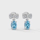 Celeste Bow Eternal Heart Drop Twirl Radiance Studs