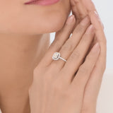 Regal Radiance Emerald Halo Ring