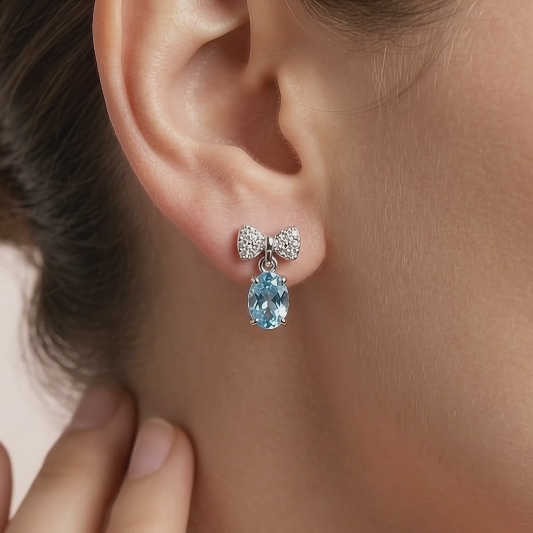 Celeste Bow Eternal Heart Drop Twirl Radiance Studs